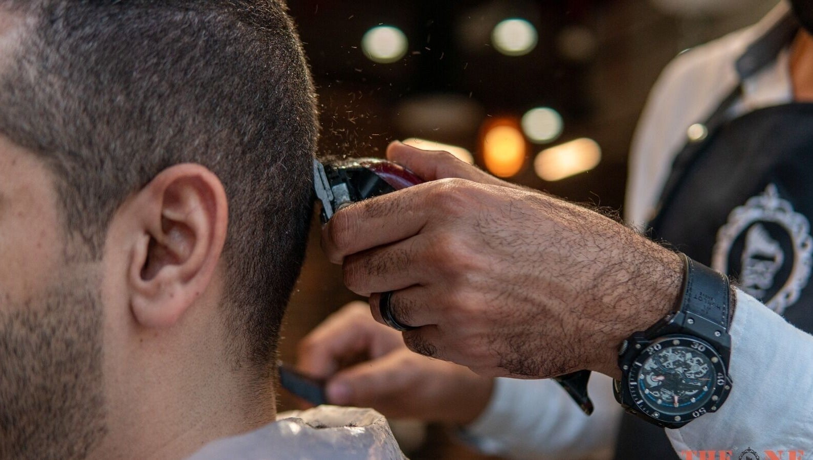 Haircut at The One Gents Salon (Tecom Branch), Dubai, Dubai, AE for precise grooming.