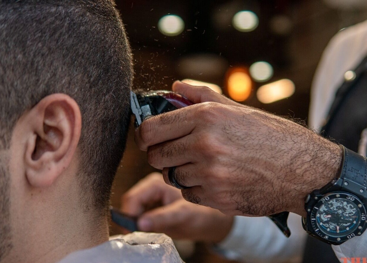 Haircut at The One Gents Salon (Tecom Branch), Dubai, Dubai, AE for precise grooming.