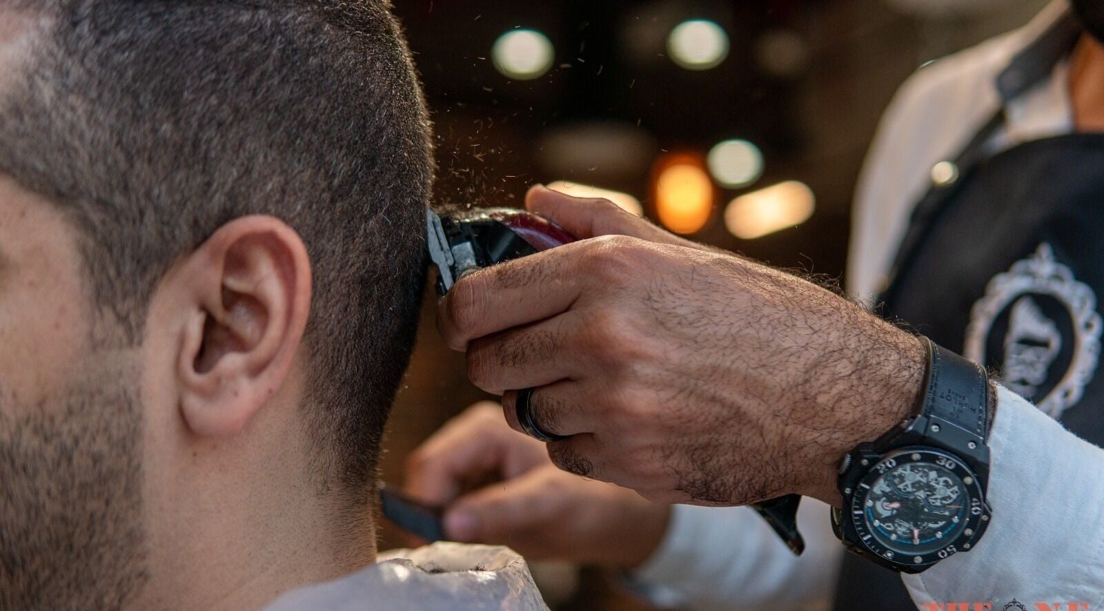 Haircut at The One Gents Salon (Tecom Branch), Dubai, Dubai, AE for precise grooming.
