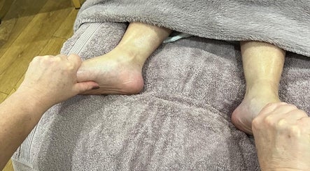 Relaxing foot massage at Catherine Rebalance Therapies in Sheffield, England, GB, enhancing wellness and comfort.
