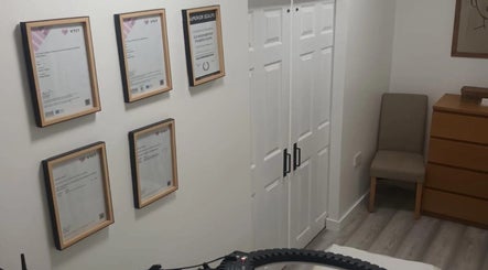 Certificates on display at Wake Up With Brows UK, London, GB, showcasing expertise and professionalism.