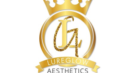 LureGlow Aesthetics & Co logo features a golden crown symbol in Portmore, St. Catherine Parish, JM.