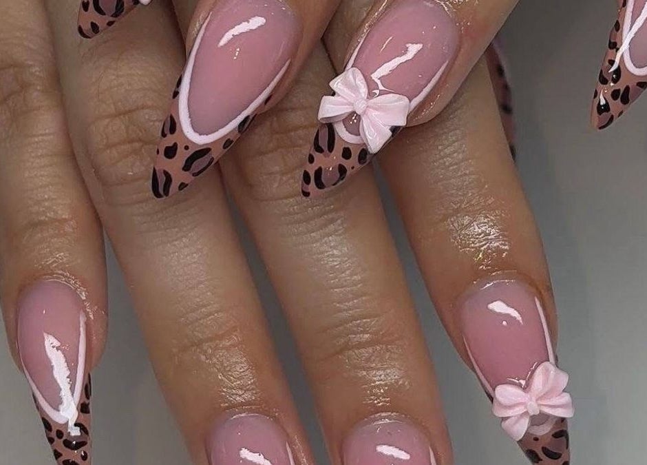 Leopard print nail design with bows at MakeupbyLGA, Portmore, St. Catherine Parish, JM.