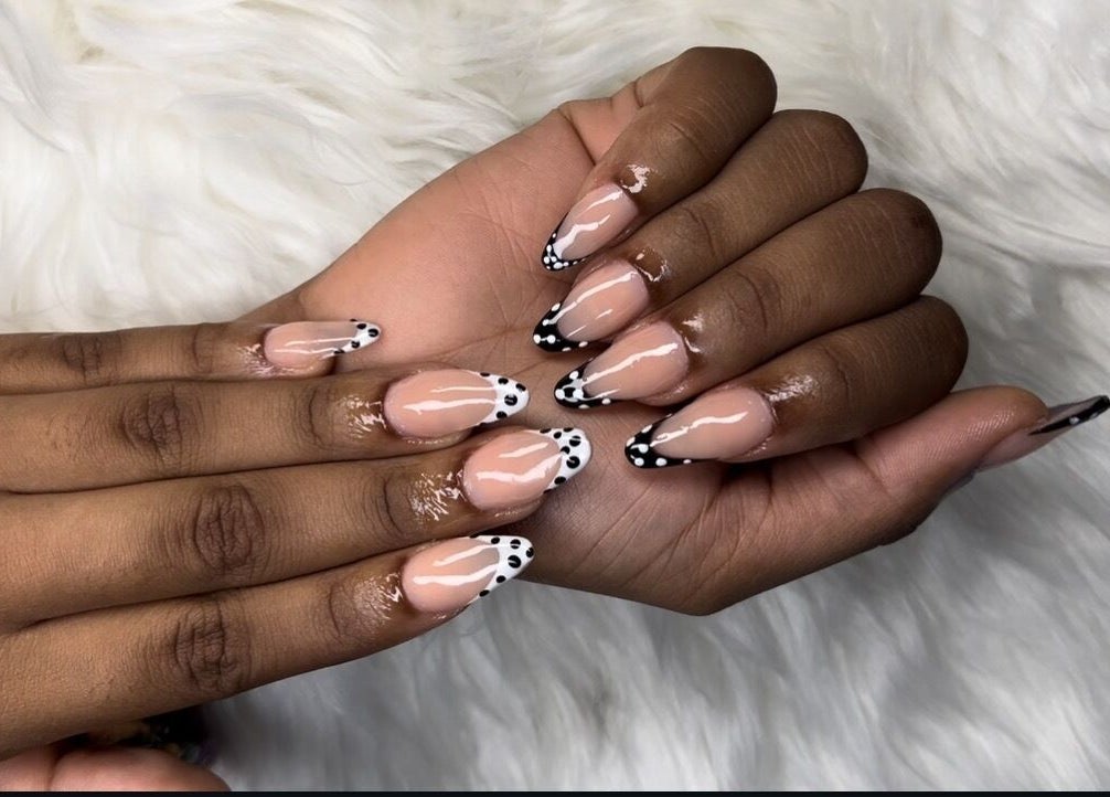 Stylish nail art with black and white dots at MakeupbyLGA in Portmore, St. Catherine Parish, JM.