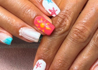 Vibrant nail art with beach theme at Clouds Beauty Studio, London, England, GB.