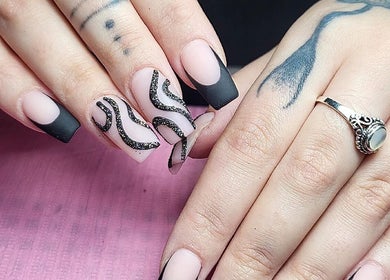 Intricate black and nude nail art design at Clouds Beauty Studio, London, England, GB.