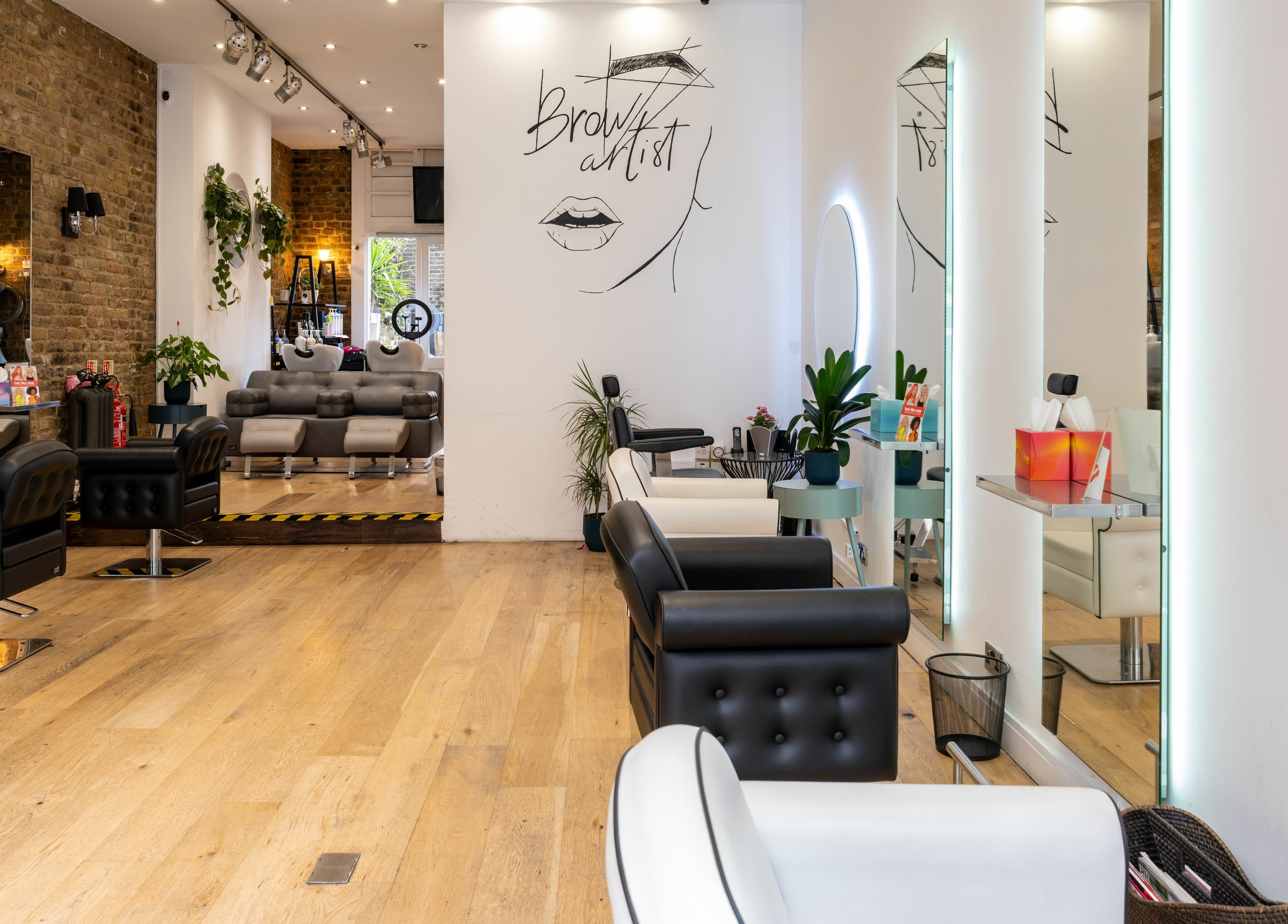 Inside Chelsea Chair salon in London, England, GB, featuring stylish seating and modern décor.