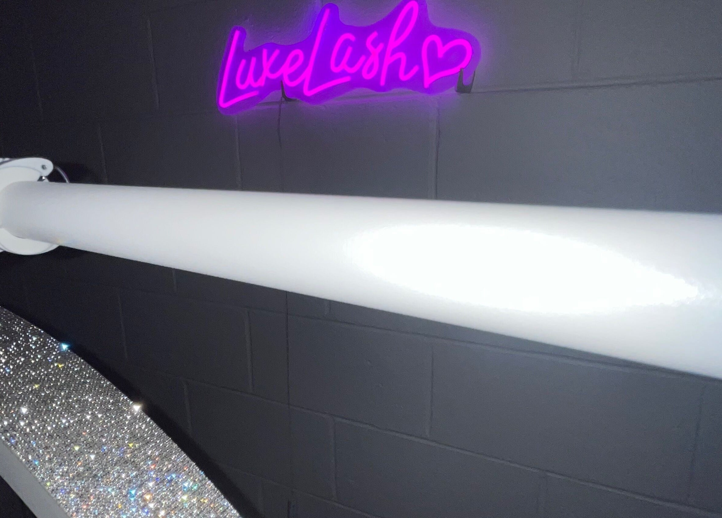 Sparkling decor and Luxe Lashes neon at Maroochydore, Queensland, AU beauty spot.