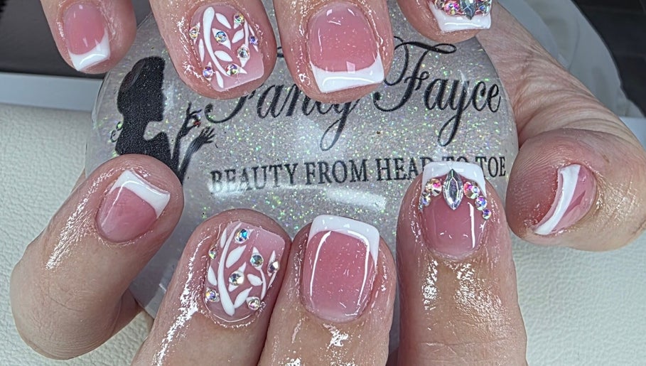 Elegant nail art with rhinestones at Fancy Fayce, Huddersfield, England, GB.