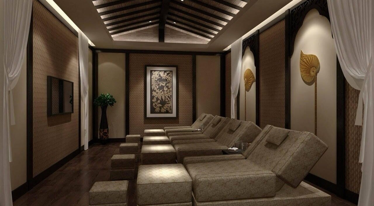 Elegant spa room at Foot Space, Phoenix, Arizona, US, featuring plush seating and decorative accents.
