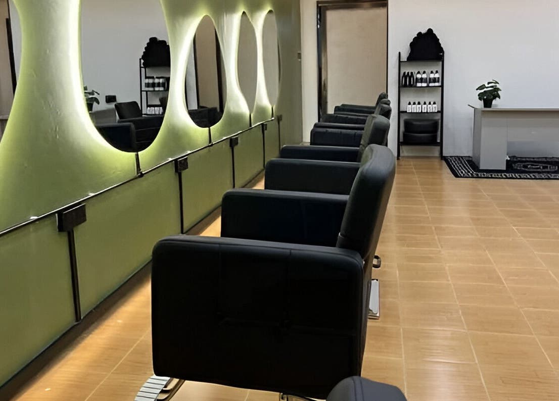 Chic interior of Myfa Salon Indera Makhota 15, Indera Mahkota, Pahang, MY with modern chairs and mirrors.