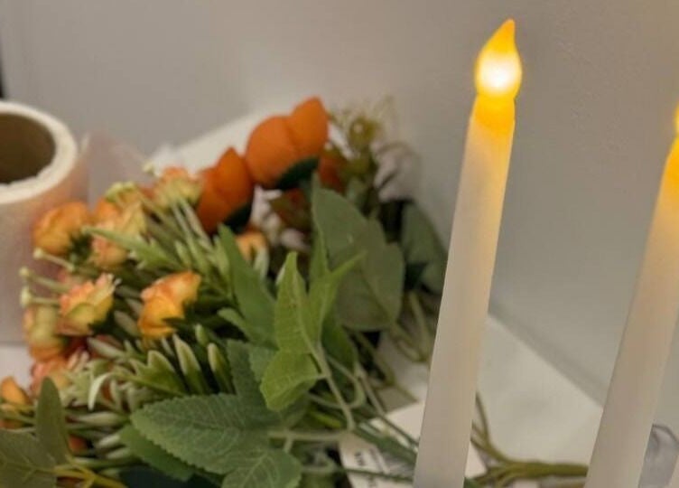 Elegant candles and flowers at Myfa Salon Indera Makhota 15, Indera Mahkota, Pahang, MY, creating a calming ambiance.