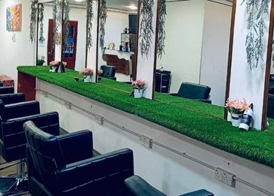 Chic interior of Myfa Salon Muslimah Bandar Kuantan with stylish chairs and greenery, located in Bandar Kuantan, Pahang, MY.