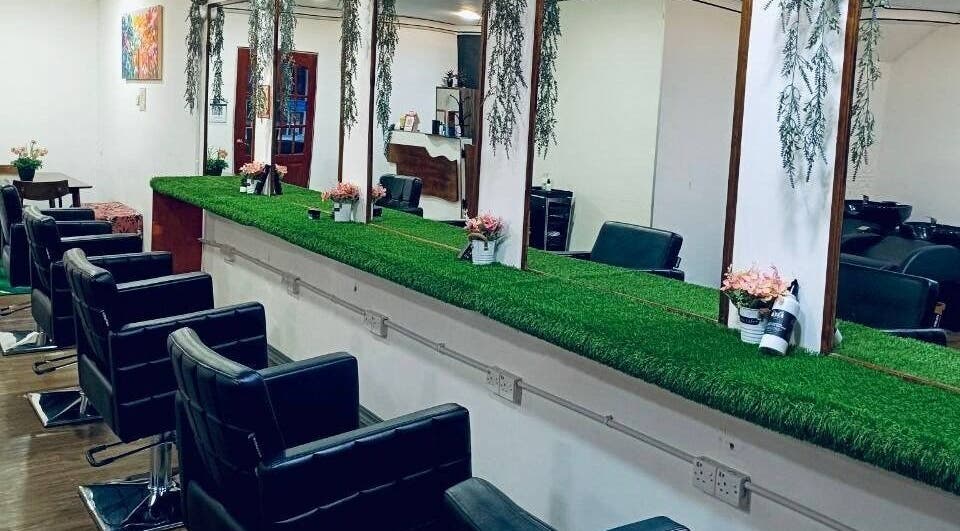 Chic interior of Myfa Salon Muslimah Bandar Kuantan with stylish chairs and greenery, located in Bandar Kuantan, Pahang, MY.