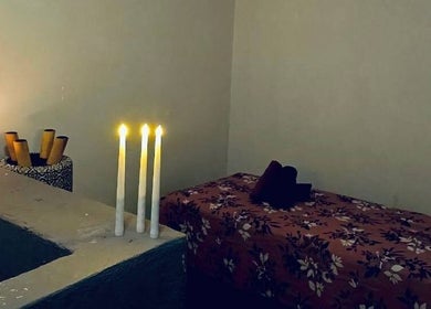 Relaxing massage room at Myfa Salon Muslimah Bandar Kuantan, Bandar Kuantan, Pahang, MY with candles and cozy decor.