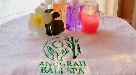 Candles and oils at Anugrah Bali Spa Home, Office and Events, Dubai, AE for a relaxing experience.