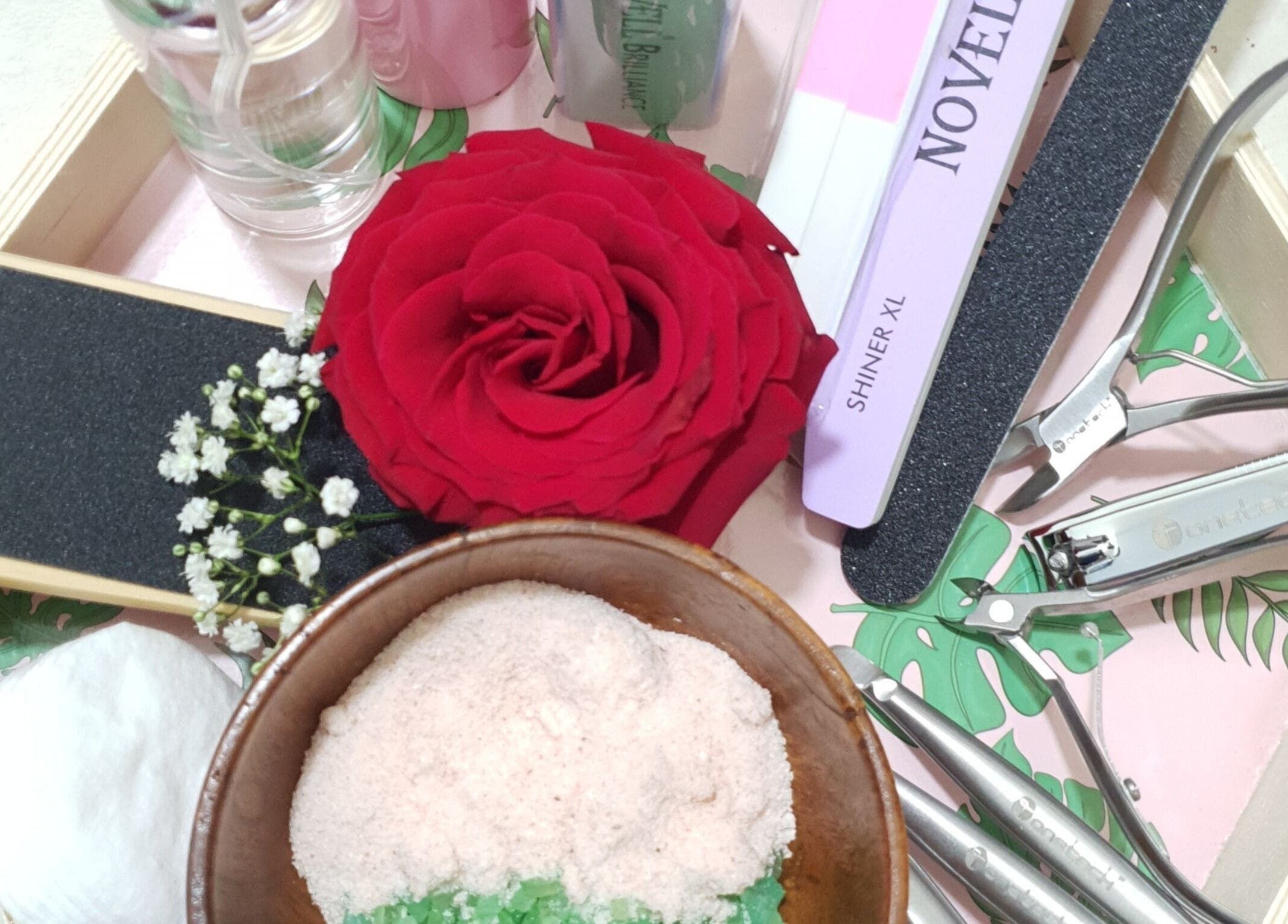 Spa tools and red rose at Anugrah Bali Spa Home, Office and Events, Dubai, AE.