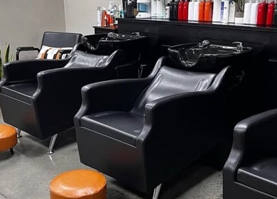 Luxurious salon chairs at Unorthodox Salon, Taylors, South Carolina, US for a relaxing experience.