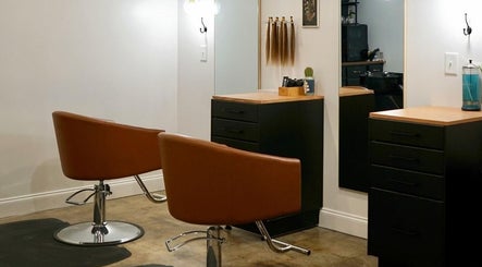 Elegant salon setup with chic chairs at Unorthodox Salon, Taylors, South Carolina, US.