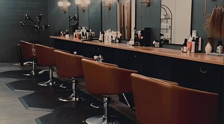 Elegant salon chairs at Unorthodox Salon in Taylors, South Carolina, US, showcasing a stylish interior.