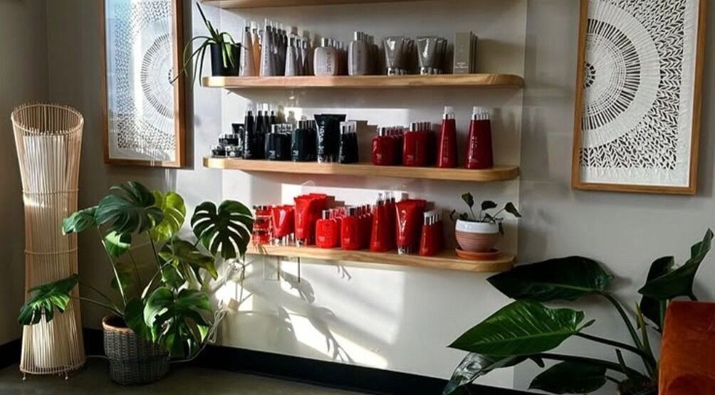 Stylish product display at Unorthodox Salon, Taylors, South Carolina, US, featuring variety of beauty products.