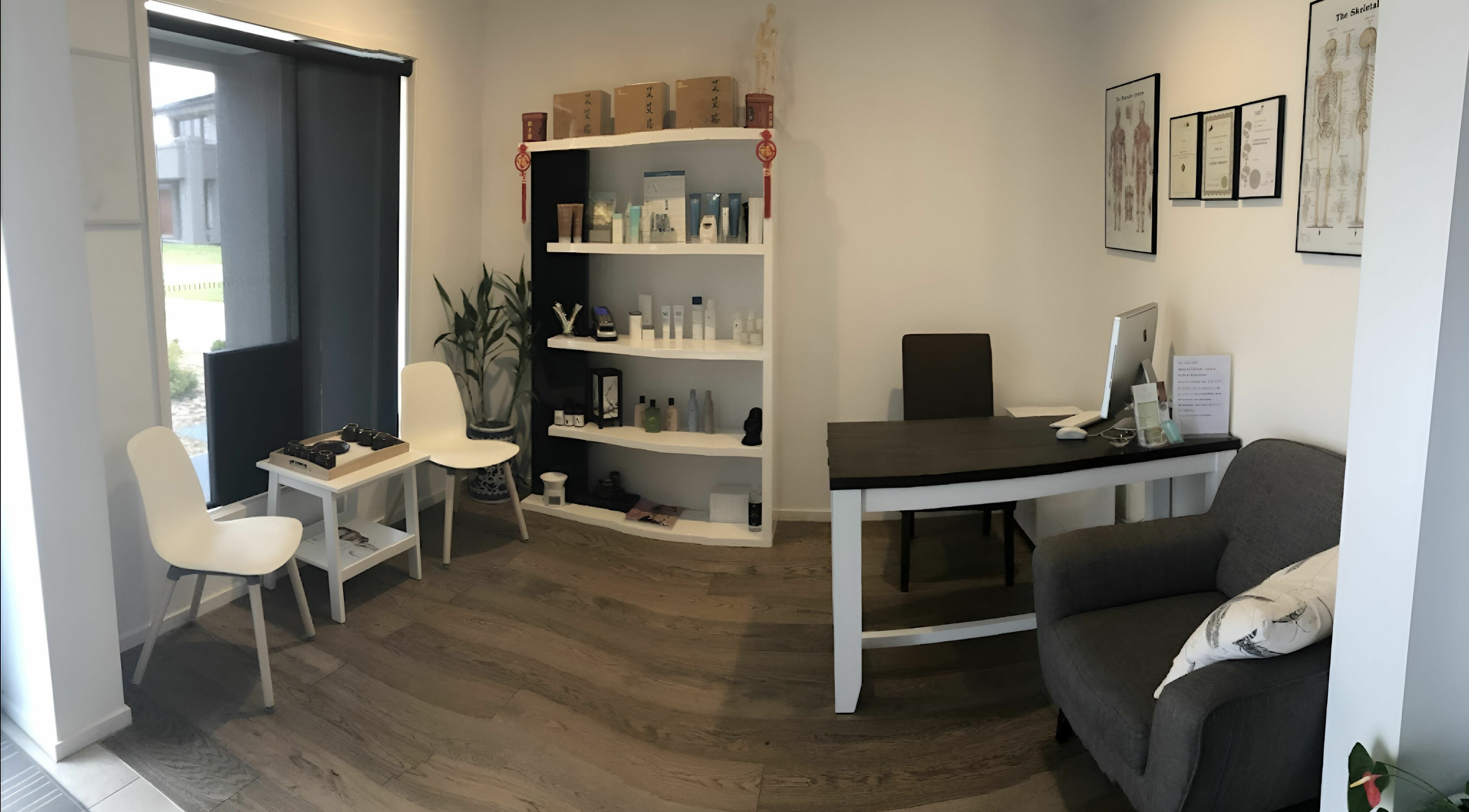 Reception area at Yuan Muscle Therapy in Melbourne, Victoria, AU with modern decor and calming ambiance.