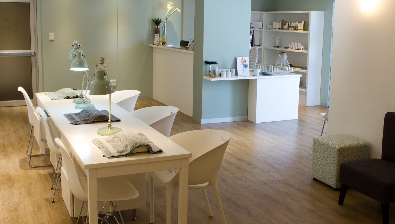 Calm, elegant interior of Origin Wellness Spa, Cape Town, Western Cape, ZA. Modern decor and ambient lighting.