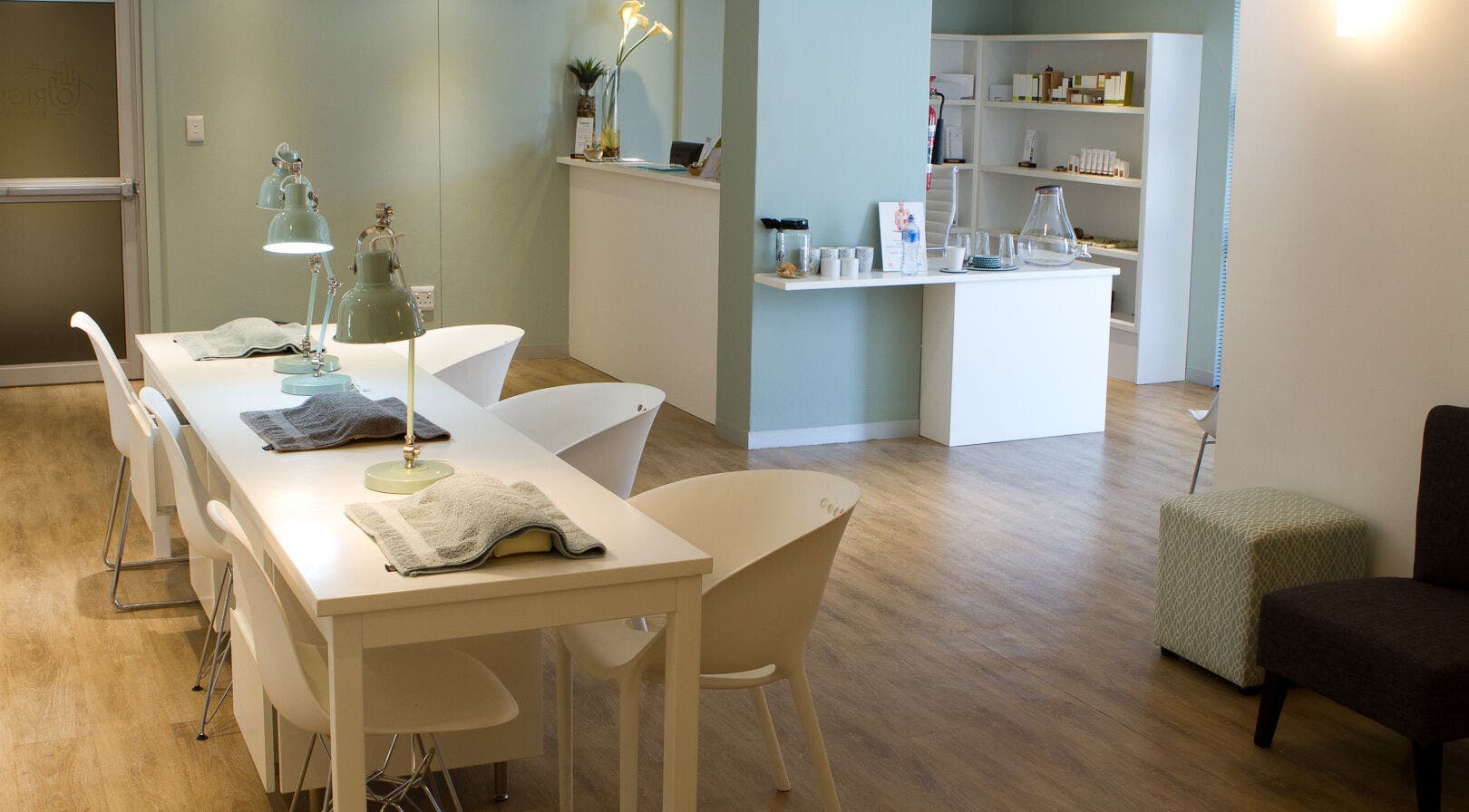 Calm, elegant interior of Origin Wellness Spa, Cape Town, Western Cape, ZA. Modern decor and ambient lighting.