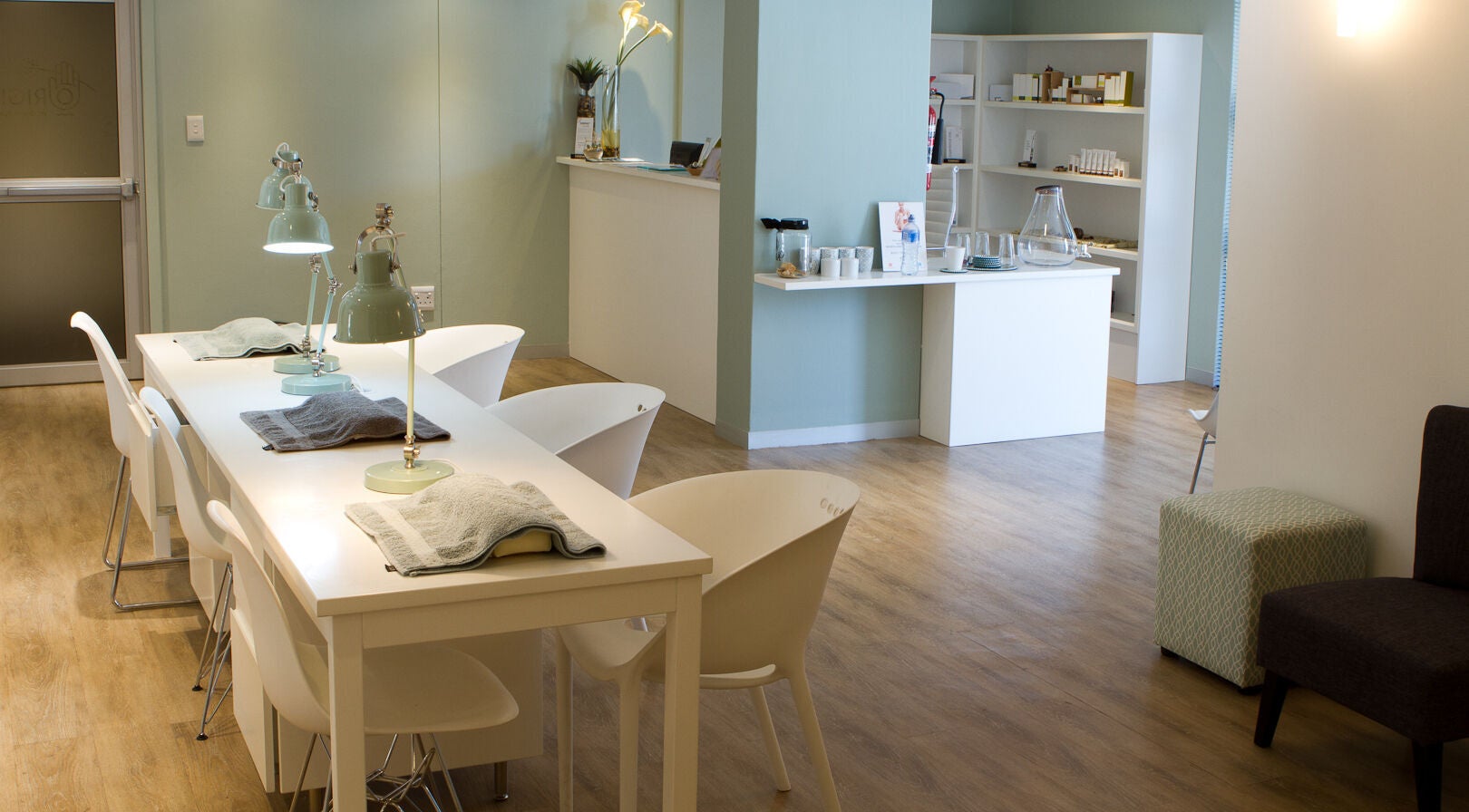 Calm, elegant interior of Origin Wellness Spa, Cape Town, Western Cape, ZA. Modern decor and ambient lighting.