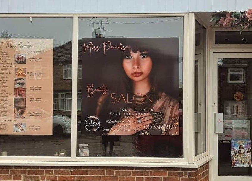 Happy Body - Massage & Physiotherapy in Peterborough, England, GB with a striking window display.