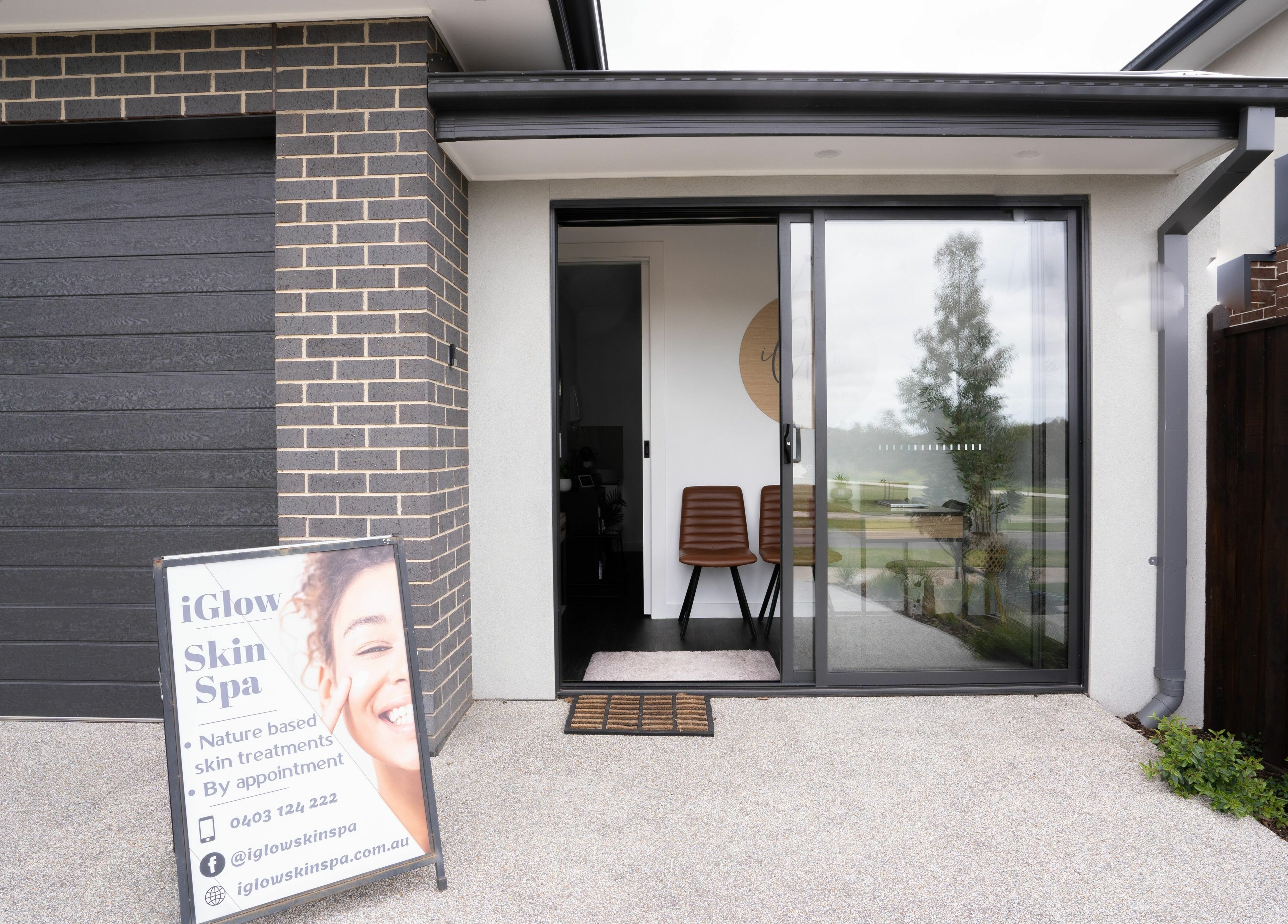 Front entrance of I Glow Skin Spa in Burnside, Victoria, AU, showcasing modern design and inviting interiors.