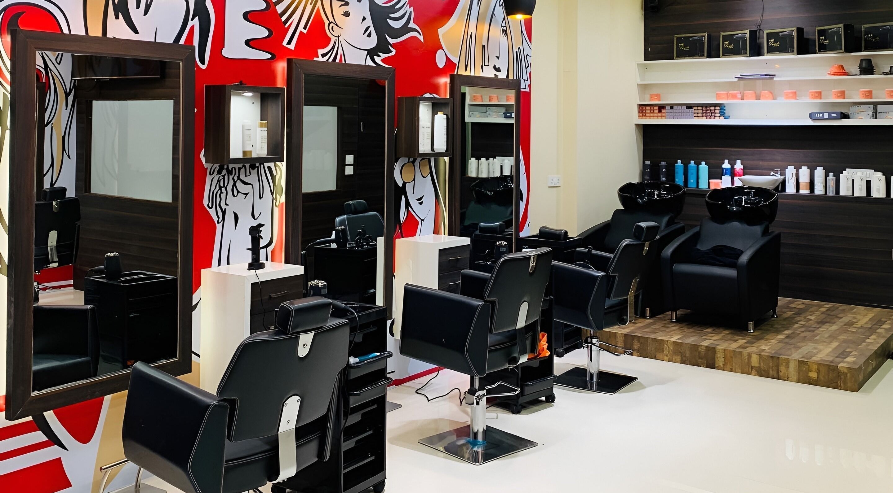 Modern salon interior at Jawed Habib Hair & Beauty Himalaya Mall, Ahmedabad, Gujarat, IN, featuring stylish chairs.