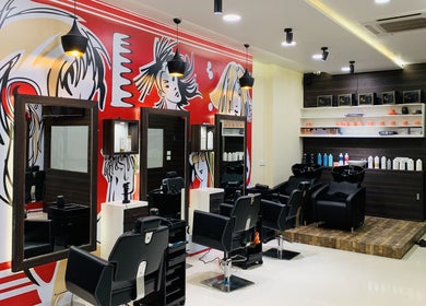 Modern interior at Jawed Habib Hair and Beauty - Sindhu Bhavan Road, Ahmedabad, Gujarat, IN with artistic wall art.