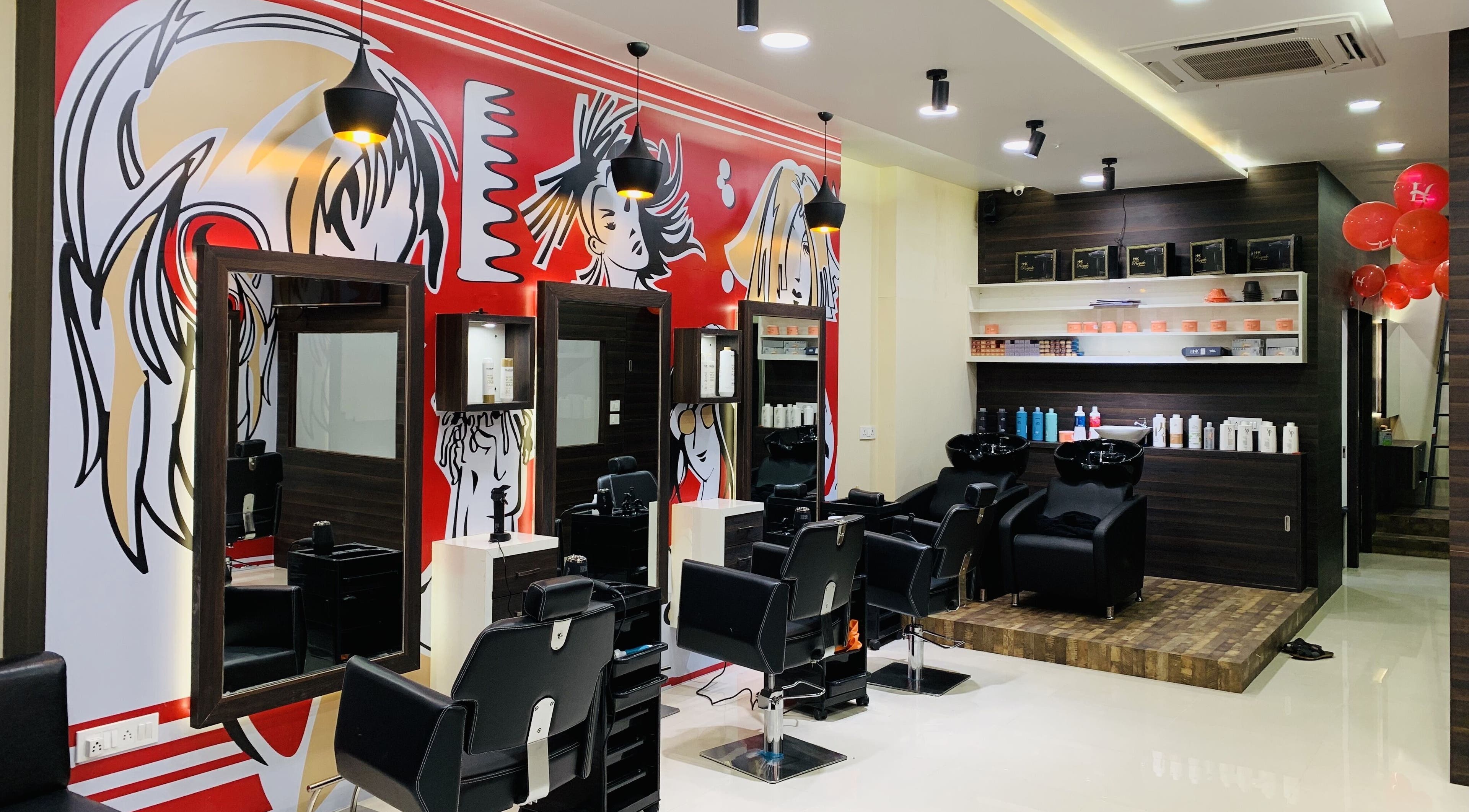 Modern interior at Jawed Habib Hair and Beauty - Sindhu Bhavan Road, Ahmedabad, Gujarat, IN with artistic wall art.