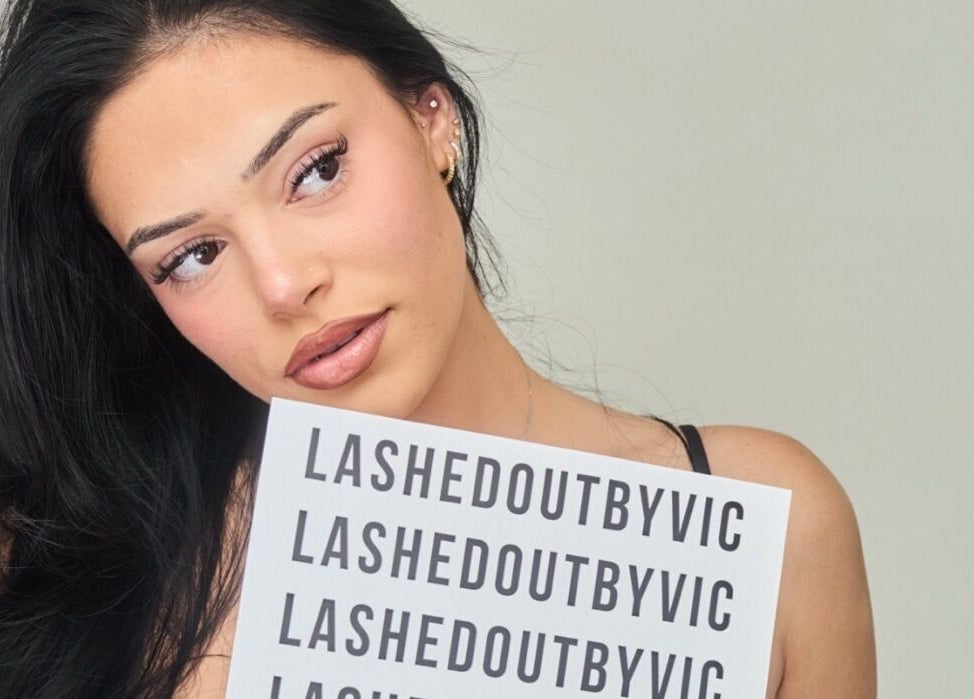 Model showcasing elegant eyelashes at Victoria | Lashed Out by Vic in Vaughan, Ontario, CA.