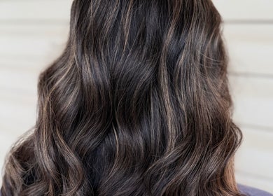 Beautiful wavy brunette hairstyle at Catherine’s Head2Toe in Kalamazoo, Michigan, US.