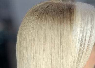 Smooth blonde hair at Joanne Slattery Hair, Hope Hair Studio in Blackburn, Scotland, GB.