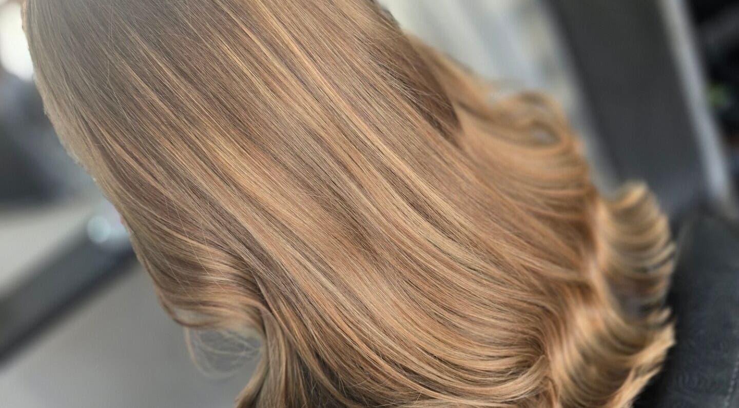 Elegant blonde hair styled at Joanne Slattery Hair, Hope Hair Studio, Blackburn, Scotland, GB.