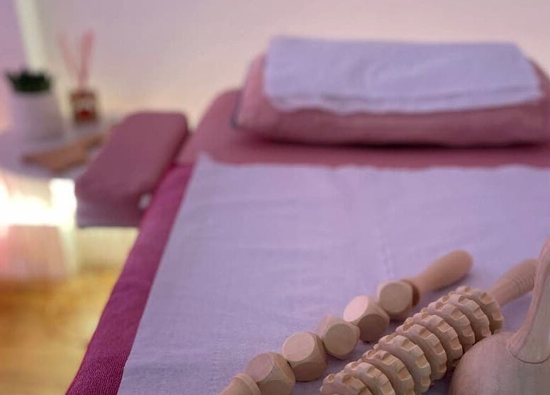 Relaxing massage table at InfraFit Studio, Rugby, England, GB, with soothing decor and calming ambiance.