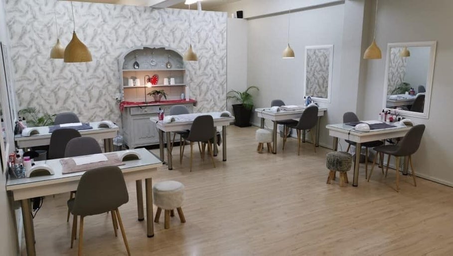 Spacious and chic interior of Classic Nails - Malvern in Queensburgh, KwaZulu-Natal, ZA with nail stations.