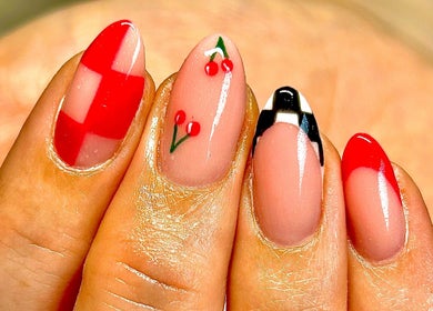 Vibrant nail art with cherries at Radiance By Becca, Halifax, England, GB.