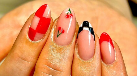 Vibrant nail art with cherries at Radiance By Becca, Halifax, England, GB.