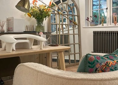 Cozy treatment area at Sulking Room Studio, Horsham, England, GB, featuring stylish decor and comfortable seating.