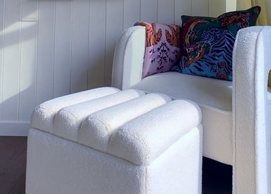 Elegant chair with colorful cushions at Sulking Room Studio, Horsham, England, GB.