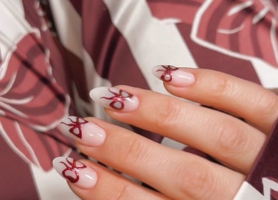 Chic red and white nail art at Sulking Room Studio, Horsham, England, GB.