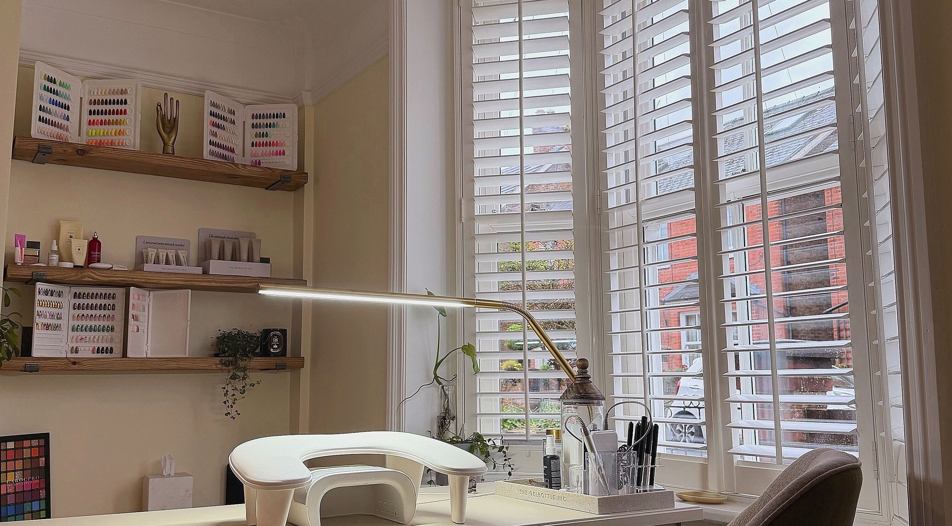 The Sulking Room nail studio with elegant decor and natural light in Horsham, England, GB.