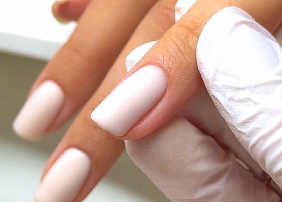 Elegant manicure service at The Sulking Room, Horsham, England, GB. Close-up of neatly painted nails.