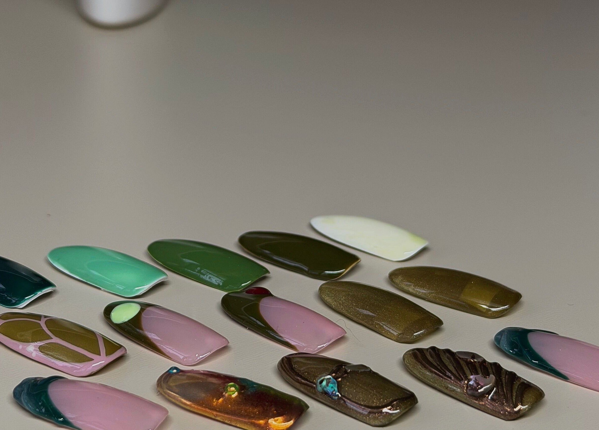 Colorful nail art samples at The Sulking Room, Horsham, England, GB. Discover your style here.