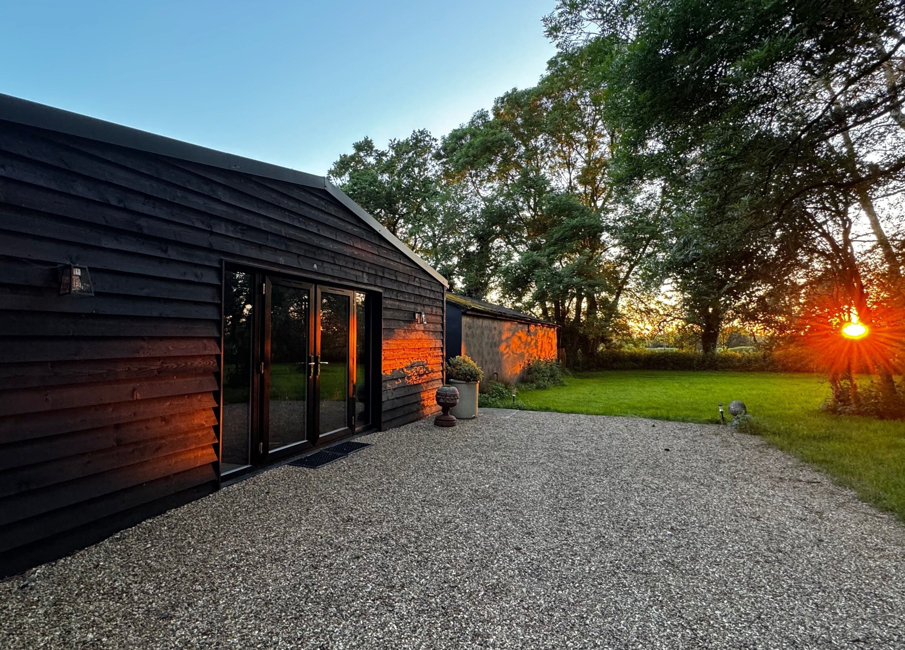 Tranquil sunset at Antoinette Aesthetics, East Harling, England, GB, highlighting peaceful natural surroundings.