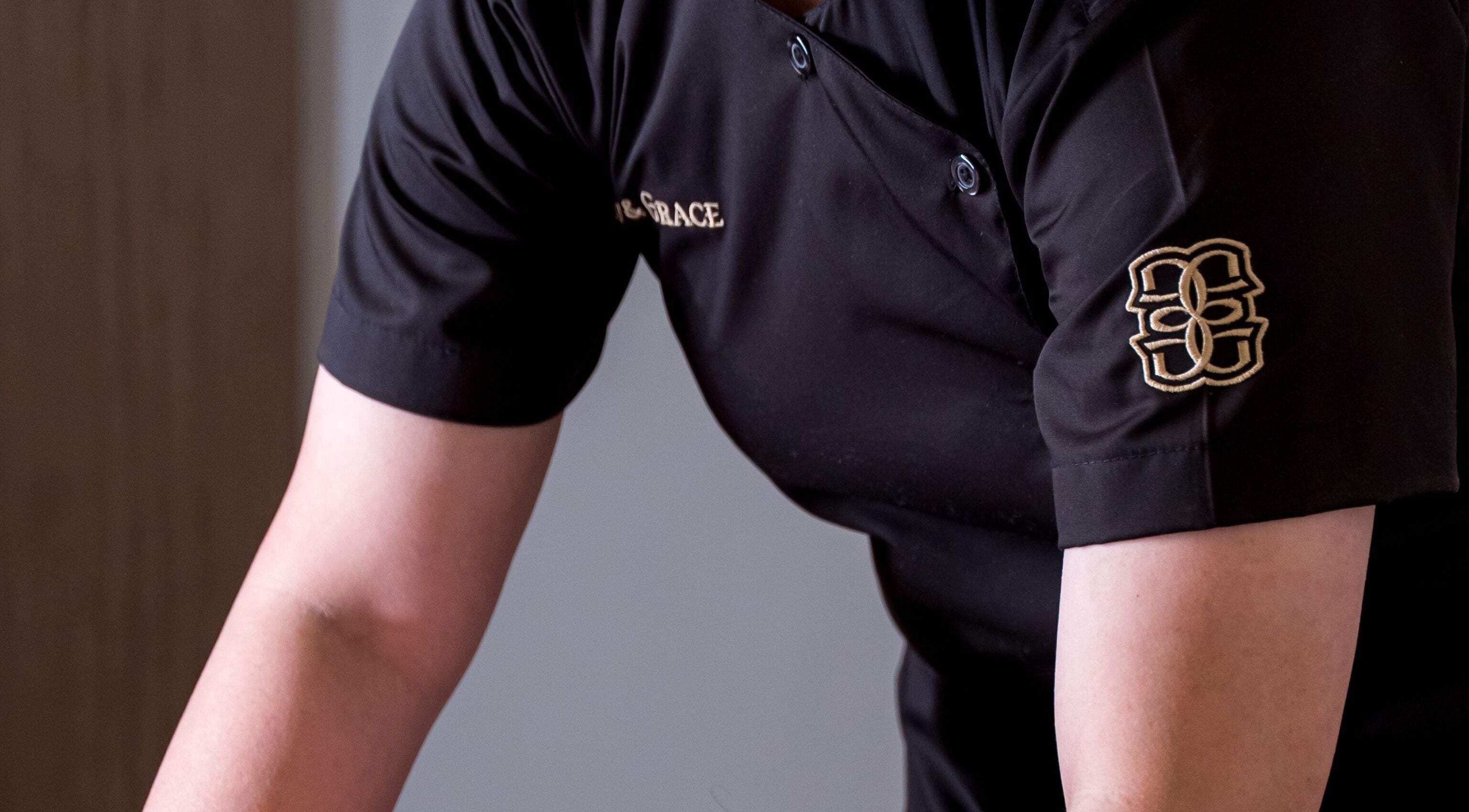 Glow & Grace - Home Service Riyadh professional in uniform preparing for a service in Riyadh, SA.